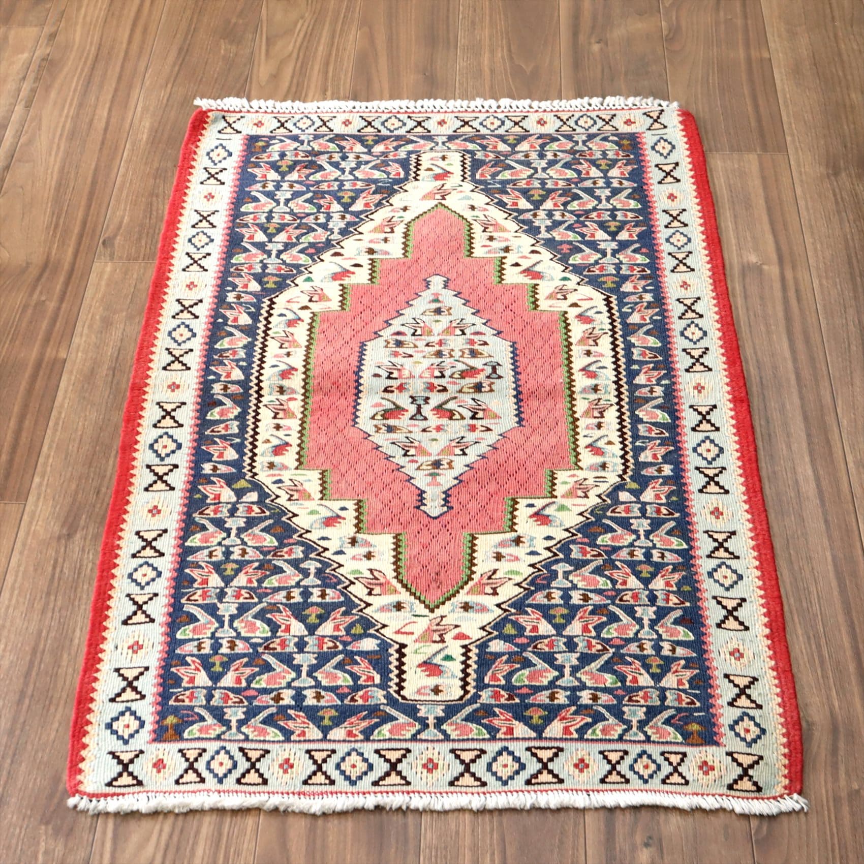 セネキリム/玄関マットサイズ103×72cm 六角メダリオンと花束のモチーフ