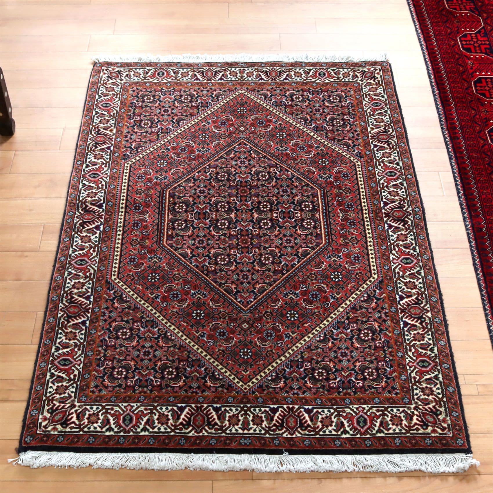 トライバルラグ ビジャール106×76cm 六角形のメダリオン レッド