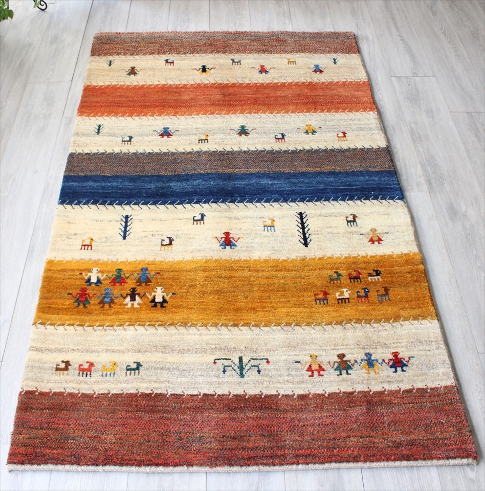 イラン直輸入ギャッベ・ノマド/センターラグサイズ カラフルなボーダーストライプ　手をつなぐ人々　動物と植物モチーフ