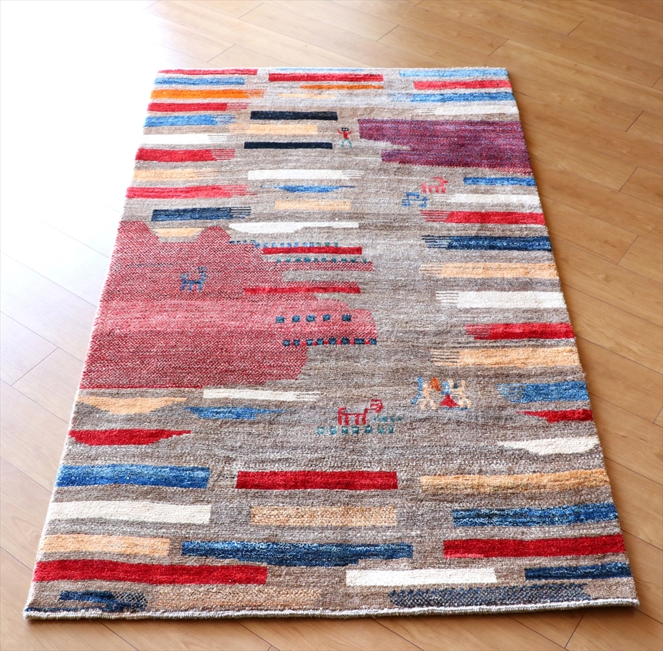 ギャッベ　Nomad/ノマド186×112cm ブラウン　カラフルなスクエア　動物や踊る人々