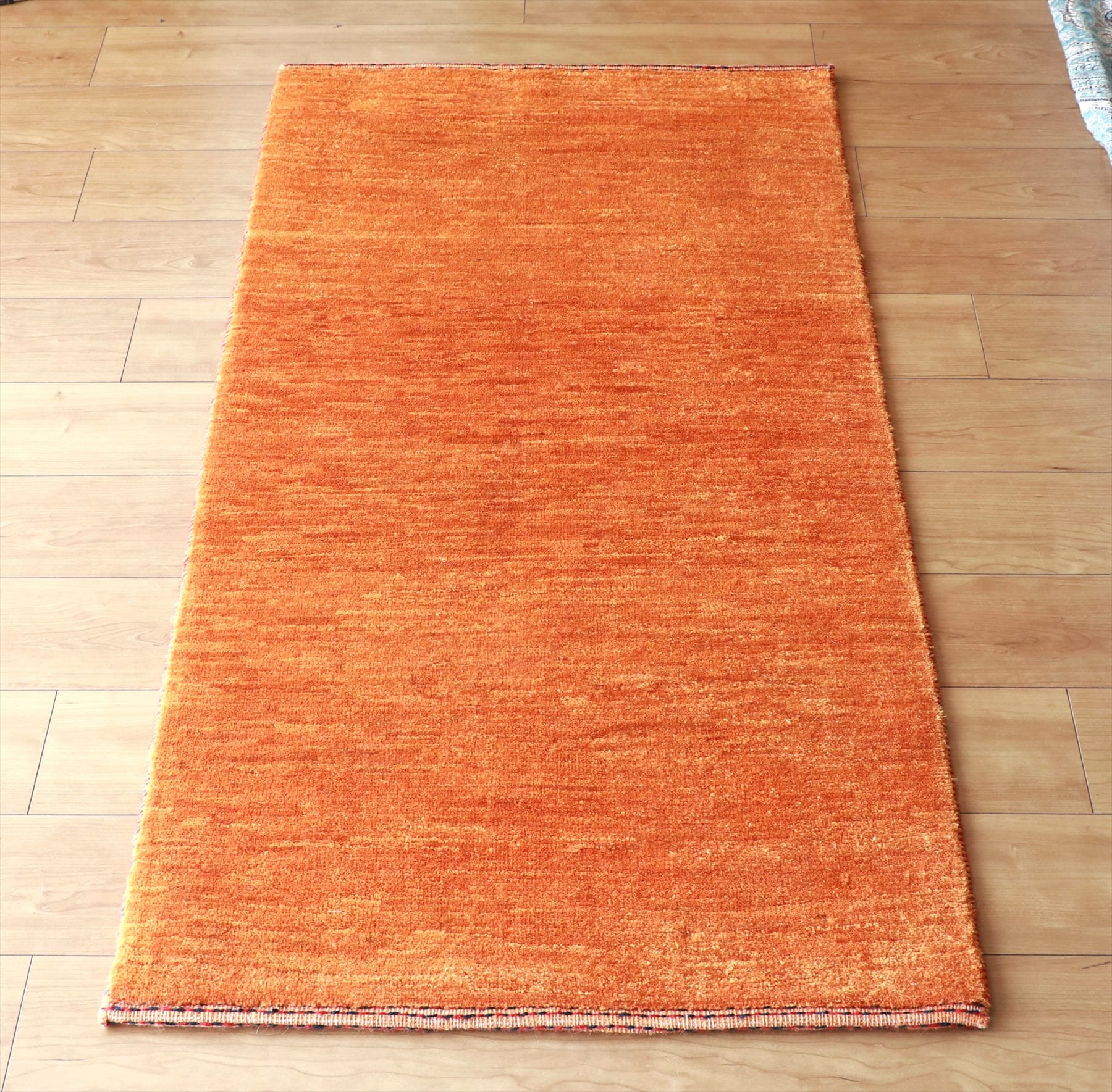 ギャッベ/シューウリ137×68cm シンプルなオレンジ　無地