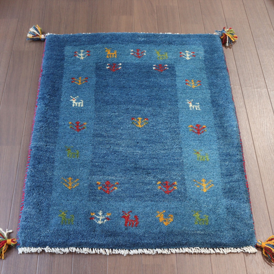 ギャッベ　玄関サイズ　ブルー88×65cm 枠縁のあるデザイン　動物と植物モチーフ