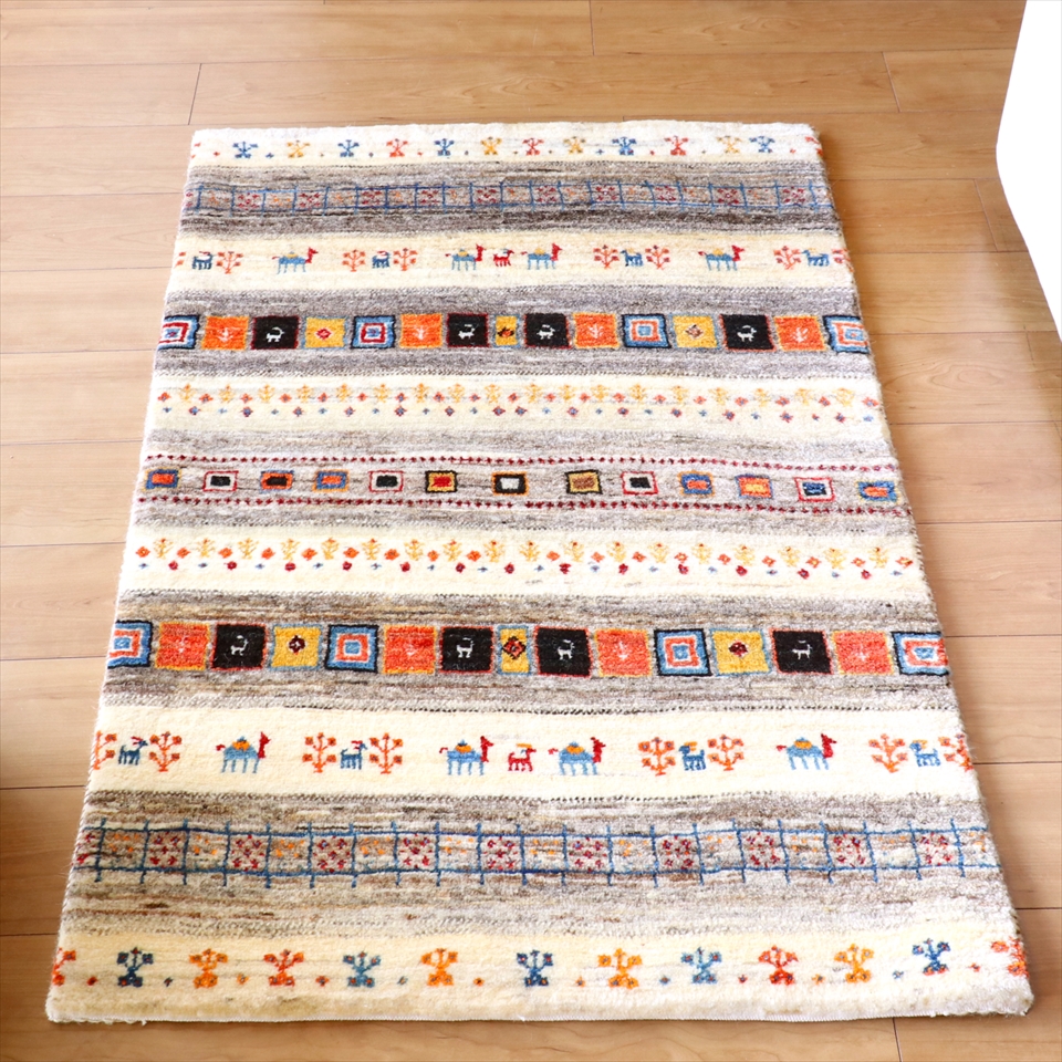 ギャッベ リズバフト 細かな織り121×77cm ラクダの隊商 オレンジやブラウンモチーフ