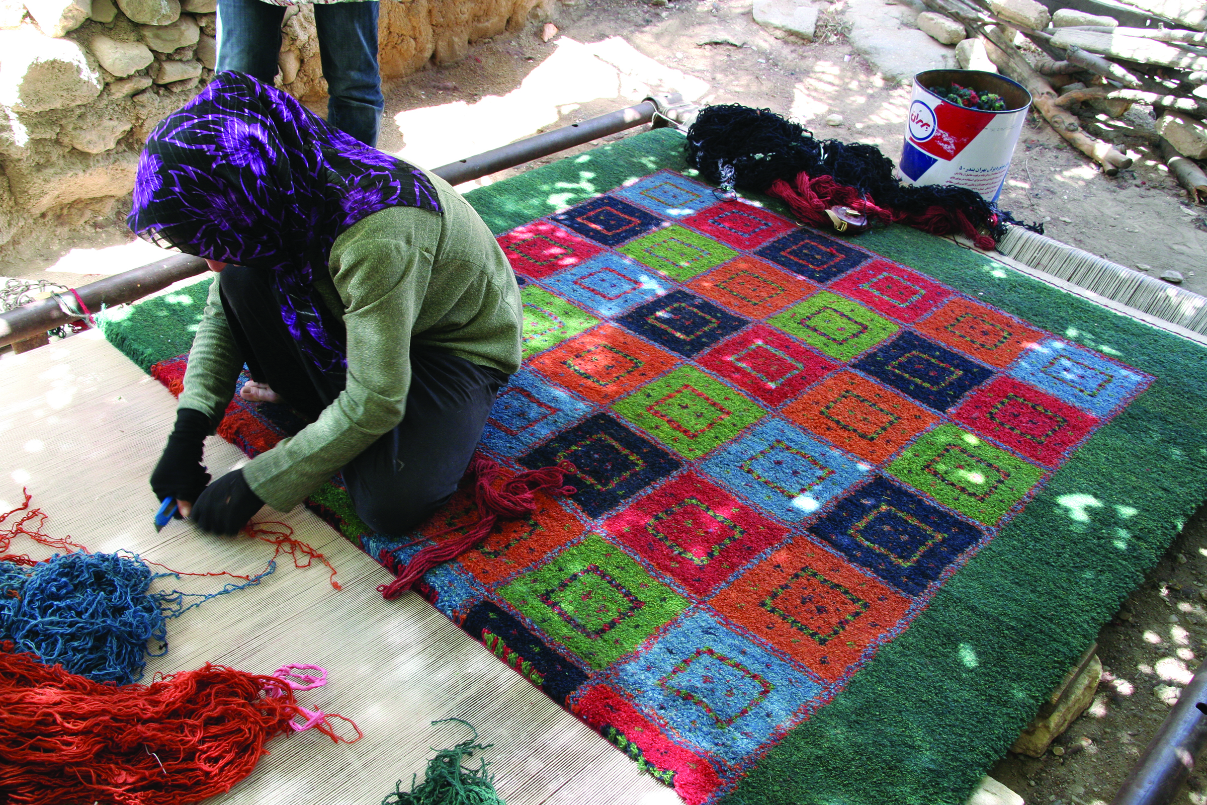 ギャッベを織る女性